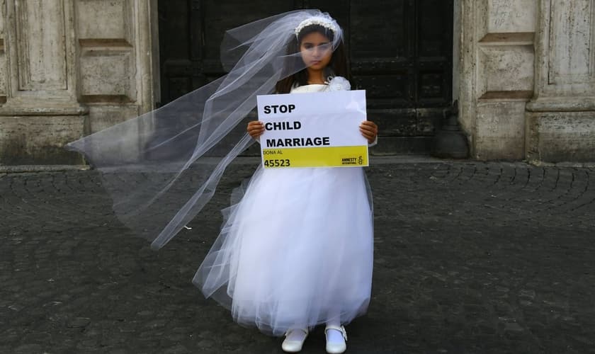 Campanha da Anistia Internacional contra o casamento infantil, em 2016. (Foto: Getty Images)