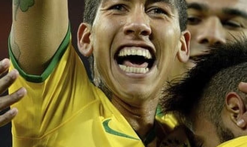 Firmino comemora golaço que decidiu a partida entra Áustria e Brasil (Foto: EFE)