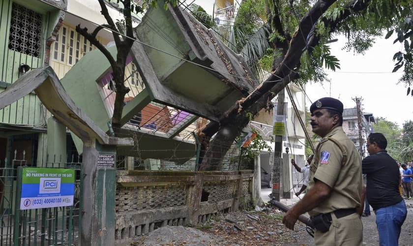 Segundo o pastor, cerca de 20 mil pessoas morreram por causa do terremoto. (Foto: AFP).