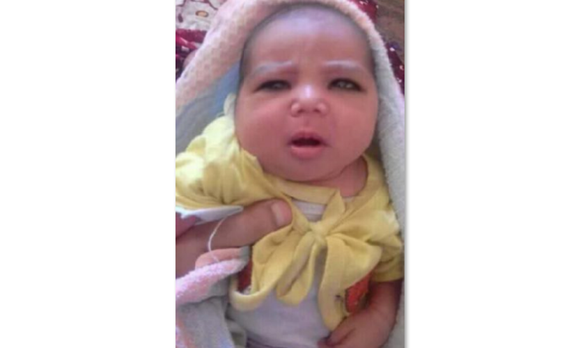 Azza teve sua filha recém nascida arrancada de seus braços. (Foto: World Watch Monitor).