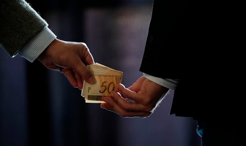 Corrupção. (Foto: Getty)