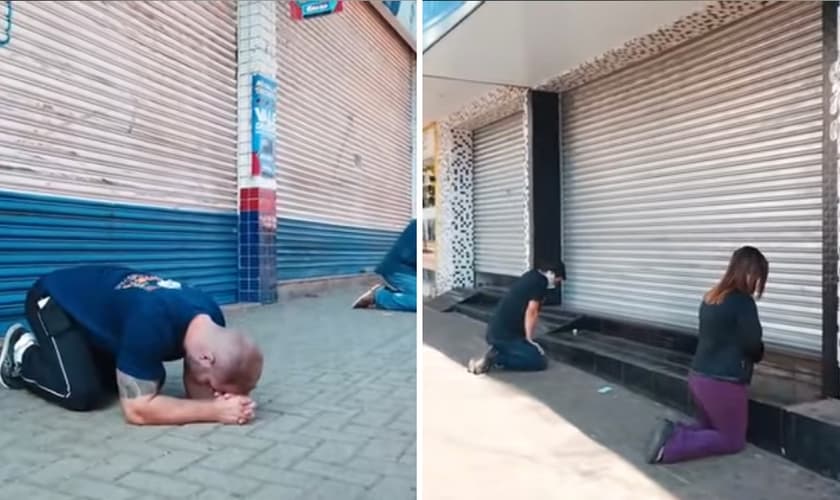 Com as lojas fechadas, comerciantes se ajoelharam em oração. (Foto: Reprodução)