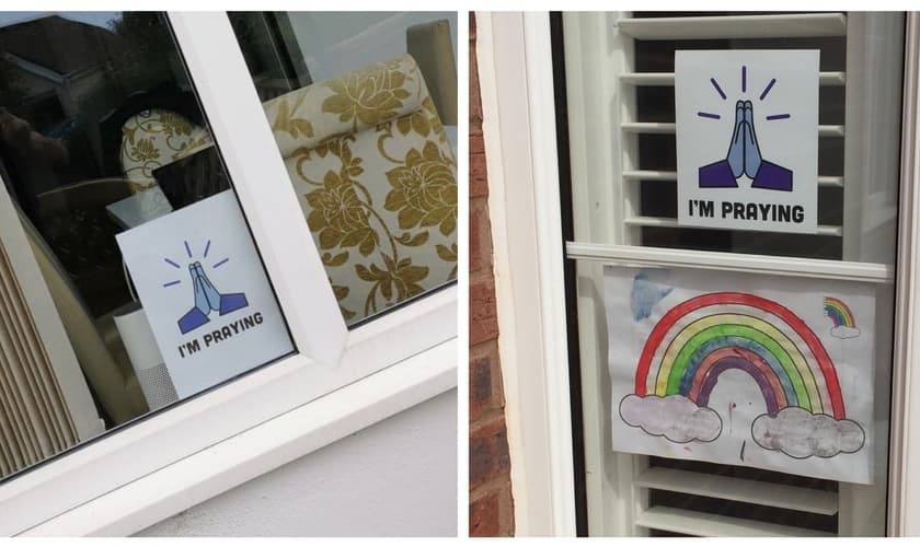 Cartaz com imagem de mãos unidas em oração: “Eu estou orando”. (Foto: Reprodução/Premier)
