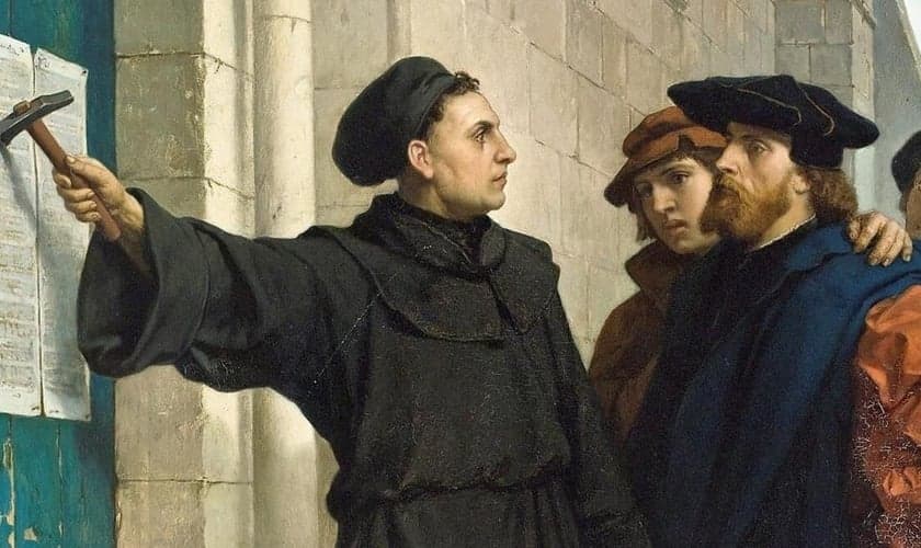 A pintura "95 Teses de Martinho Lutero" (1872), óleo sobre tela, de Ferdinand Pauwels (1830-1904). (Imagem: Wikipédia)