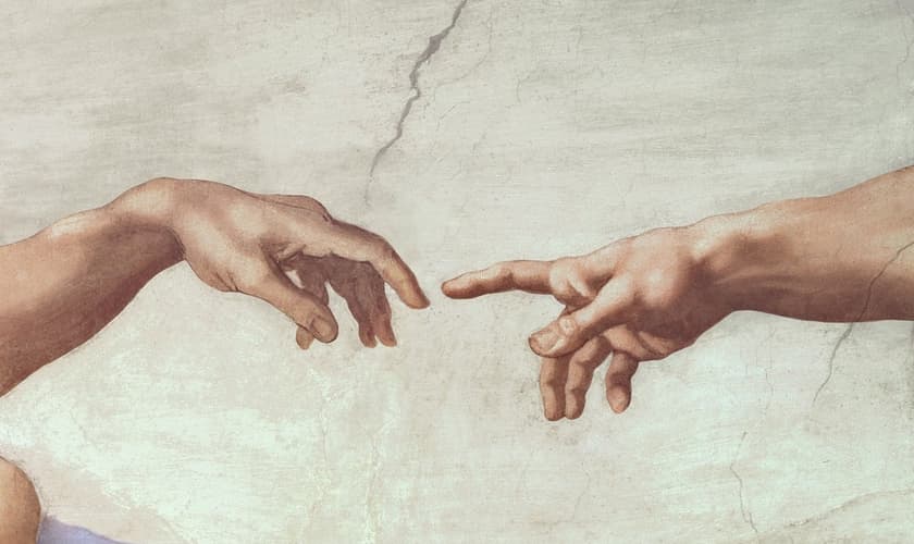 Deus estendendo a mão para Adão; detalhe da obra-prima de Michelangelo na Capela Sistina. (Imagem: Domínio público)